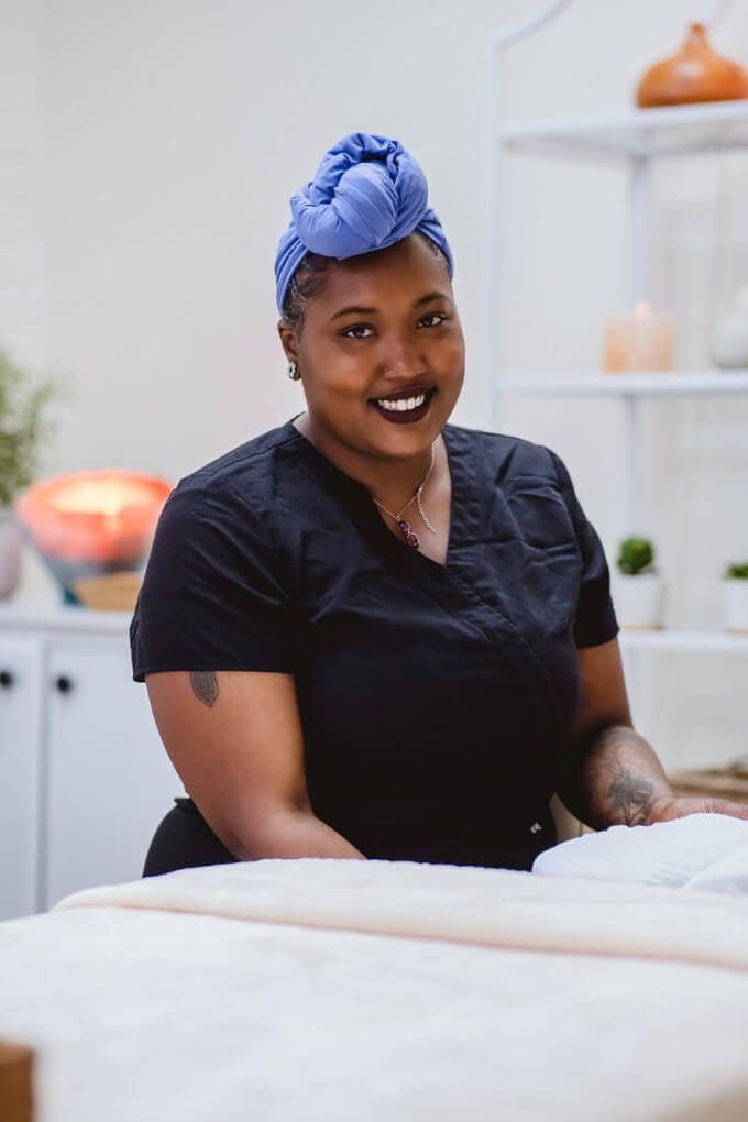 Prenatal Massage at Zen'd Out Massage Spa A therapist smling towards the camera