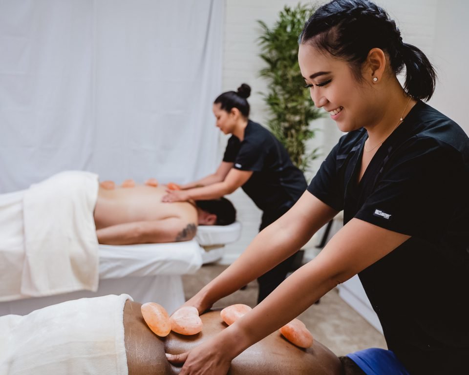 Couples Hot Stone Massage in Denver, Colorado at Zen'd Out Couples Massage Spa