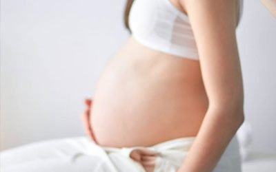 A photo of a pregnant woman's belly